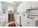 Laundry room featuring a washer, dryer, and a large sink at 20007 Bragg, Chapel Hill, NC 27517