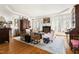 Comfortable living room with a fireplace, neutral furnishings, and lots of natural light at 20007 Bragg, Chapel Hill, NC 27517