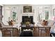 Bright living room with fireplace, classic decor, and ample seating arrangement at 20007 Bragg, Chapel Hill, NC 27517