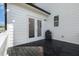 Cozy back deck with a grilling area providing outdoor access with a view of the home's yard at 208 Dry Canyon Dr, Wendell, NC 27591