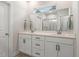 Bathroom features double sinks, modern fixtures, and glass shower at 208 Dry Canyon Dr, Wendell, NC 27591