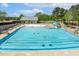 Enjoy this fantastic community pool with a slide, seating, and plenty of space to relax in the sun at 208 Dry Canyon Dr, Wendell, NC 27591