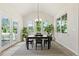 Dining room with a modern chandelier, vaulted ceiling, and lots of natural light at 208 Dry Canyon Dr, Wendell, NC 27591