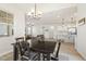 Dining area leading into the kitchen, and views of the living room at 208 Dry Canyon Dr, Wendell, NC 27591