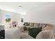 Spacious living room with natural light and comfortable seating at 208 Dry Canyon Dr, Wendell, NC 27591