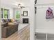 Inviting living room with a fireplace, neutral colors, and ample natural light at 208 Dry Canyon Dr, Wendell, NC 27591