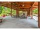 This open-air pavilion features a stone fireplace and picnic tables, ideal for gatherings with friends and Gathering at 208 Dry Canyon Dr, Wendell, NC 27591