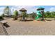 Fun community playground with climbing structures, slides, and ample space for children to play and explore at 208 Dry Canyon Dr, Wendell, NC 27591