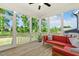 Cozy screened porch featuring comfortable seating and peaceful outdoor views at 208 Dry Canyon Dr, Wendell, NC 27591