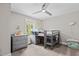 ' bedroom with neutral paint, carpet, and ample natural light with grey furniture at 2135 Vittorio Ln, Apex, NC 27502