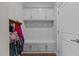 Inviting mudroom with built-in storage, seating, and hanging space offers convenience and organization at 2135 Vittorio Ln, Apex, NC 27502
