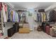 Spacious walk-in closet with custom shelving and ample storage for clothing and accessories at 2135 Vittorio Ln, Apex, NC 27502