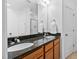 Bathroom with granite countertops and double sinks with neutral paint color at 2242 Sweet Annie Way, Wake Forest, NC 27587