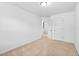 Carpeted bedroom with neutral paint leading to closet and bathroom at 2242 Sweet Annie Way, Wake Forest, NC 27587