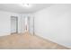 Bedroom with carpet and neutral paint color with closet at 2242 Sweet Annie Way, Wake Forest, NC 27587