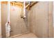 Unfinished basement showcasing exposed beams and plumbing in new home construction at 279 Hopewell Branch Ct, Smithfield, NC 27577