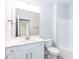 Bathroom featuring a single sink vanity, vinyl floors, and a tub with shower at 279 Hopewell Branch Ct, Smithfield, NC 27577