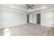 Spacious bedroom with neutral carpet, multiple doorways, and ample natural light at 279 Hopewell Branch Ct, Smithfield, NC 27577