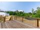 Spacious wooden deck providing an outdoor living space, with a view of the surrounding neighborhood at 279 Hopewell Branch Ct, Smithfield, NC 27577