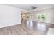 Bright open-concept living room featuring hard surface floors, and a ceiling fan at 279 Hopewell Branch Ct, Smithfield, NC 27577