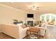 Bright living room with hardwood flooring and fireplace at 3002 Dog Rose Dr # 310, Durham, NC 27703
