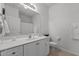 Well-lit bathroom featuring a spacious vanity and neutral tiling at 3015 Winston Dr # 117, Burlington, NC 27215