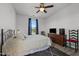Cozy bedroom with hardwood floors, a ceiling fan, and a window that lets in natural light at 3015 Winston Dr # 117, Burlington, NC 27215