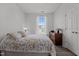 Inviting bedroom with ample natural light and wood-look flooring at 3015 Winston Dr # 117, Burlington, NC 27215
