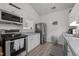 Efficient kitchen featuring modern appliances, ample counter space, and overhead microwave at 3015 Winston Dr # 117, Burlington, NC 27215