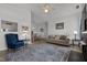 Spacious living room with a fireplace, adjacent dining area, and comfortable seating at 3015 Winston Dr # 117, Burlington, NC 27215