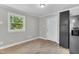 Modern kitchen featuring stainless steel appliances, white countertops, and ample cabinet space at 308 Lynn Road, Durham, NC 27703