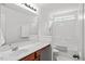 Well-lit bathroom featuring a single vanity, tiled shower, and modern fixtures at 3169 Diana Cir, Burlington, NC 27215