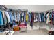 Spacious walk-in closet featuring ample storage space, clothing racks, and organized storage solutions at 3169 Diana Cir, Burlington, NC 27215