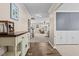 Welcoming foyer with hard wood floors and natural light that leads to the living room and stairway at 3169 Diana Cir, Burlington, NC 27215