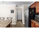 Kitchen view with stainless steel refrigerator, pantry and decor at 3169 Diana Cir, Burlington, NC 27215