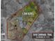 Aerial view showcasing the property's 1.399 acres, mature trees, and proximity to 3418 Carriage Trail, Hillsborough, NC at 3418 Carriage Trl, Hillsborough, NC 27278