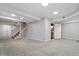 Spacious finished basement with new carpet, stairs and access to other areas at 3418 Carriage Trl, Hillsborough, NC 27278