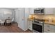 Functional kitchen with stainless steel appliances, granite countertops, and ample storage space at 3418 Carriage Trl, Hillsborough, NC 27278