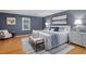 Serene primary bedroom with hardwood floors, an ensuite and stylish furnishings at 3418 Carriage Trl, Hillsborough, NC 27278