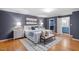 Spacious primary bedroom with wood floors, ensuite, walk-in closet and contemporary decor at 3418 Carriage Trl, Hillsborough, NC 27278