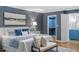 Beautiful primary bedroom with hardwood floors, a walk-in closet, an ensuite bathroom and nice natural light at 3418 Carriage Trl, Hillsborough, NC 27278