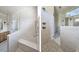 Bathroom showing a walk-in shower featuring white textured tile and a built in bench seat at 35 Big Bear Dr, Pittsboro, NC 27312