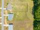 Aerial view showing a home with a large backyard and the layout of neighboring properties at 357 Sherrill Farm Dr, Benson, NC 27504