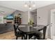 Inviting dining space with a modern table set next to the living area at 357 Sherrill Farm Dr, Benson, NC 27504