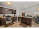 Well-equipped kitchen with stainless steel appliances, granite countertops, and ample cabinet space at 357 Sherrill Farm Dr, Benson, NC 27504