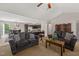 Open-concept living area with comfortable seating, a view into the dining area, and natural light creating a spacious feel at 357 Sherrill Farm Dr, Benson, NC 27504