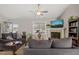 Inviting living room with a fireplace, window, and seating, showcasing a warm and comfortable gathering space at 357 Sherrill Farm Dr, Benson, NC 27504