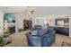 Spacious living area with fireplace, open to the kitchen and dining area, perfect for entertaining and Gathering gatherings at 357 Sherrill Farm Dr, Benson, NC 27504