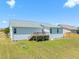 Backyard view with deck, showcasing the home's outdoor space at 357 Sherrill Farm Dr, Benson, NC 27504