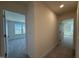 Hallway leading to bedrooms with neutral carpet flooring at 367 Whitley Ridge Dr, Clayton, NC 27527